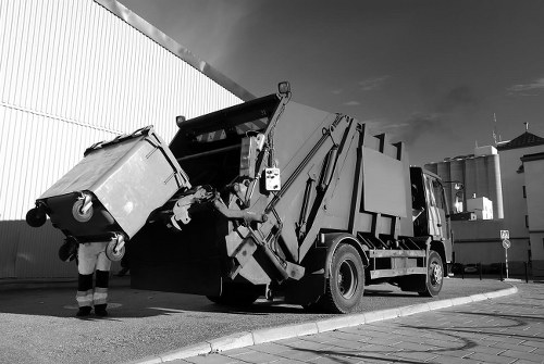 Waste clearance truck operating in Swiss Cottage