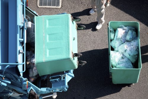 Residential waste clearance team removing furniture in North West London